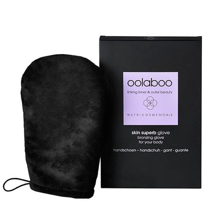 Oolaboo Skin Superb Bronzing Glove handske ved siden af æske