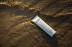 Alpha-H Balancing Cleanser tube i vandet