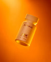 Alpha-H Liquid Gold + Vitamin C Exfoliating Treatment flakon i orange lys
