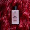 BDK Parfums Hair Perfume Rouge Smoking flakon på rødt hår
