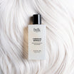 BDK Parfums Hair Perfume Tubereuse Imperiale flakon på platinblondt hår