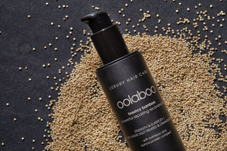 Oolaboo Bouncy Bamboo Repair Shampoo på et leje af frø