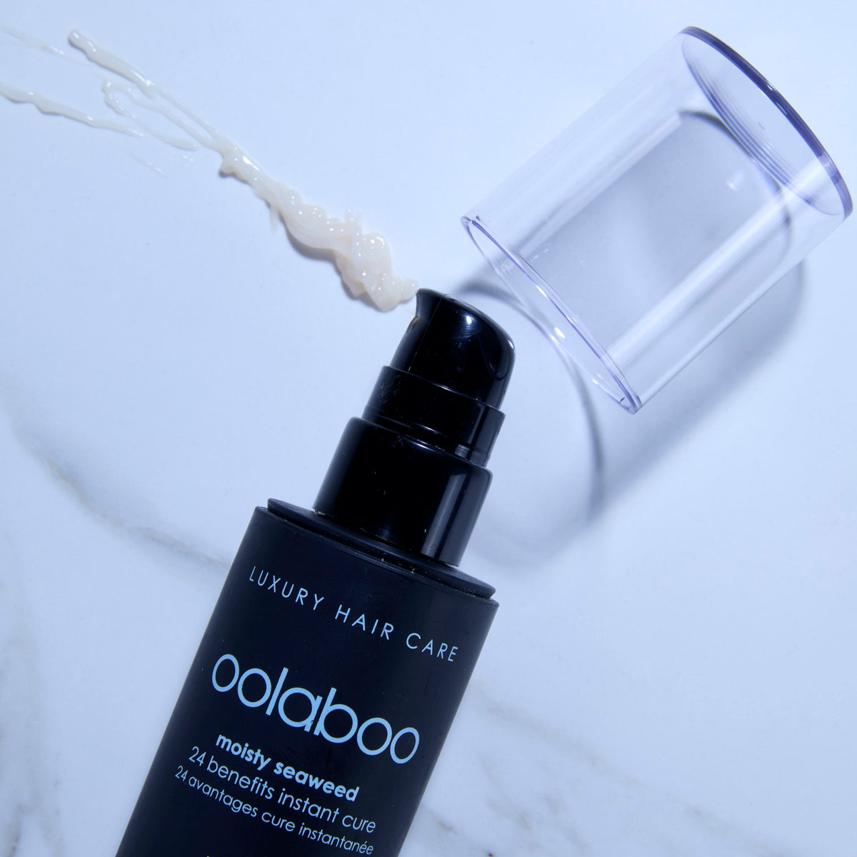 Oolaboo Moisty Seaweed 24 Benefits Instant Cure med cremetekstur på marmor