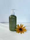Oolaboo Nature As Essence Guardian Angel Primer pumpeflaske med gul blomst