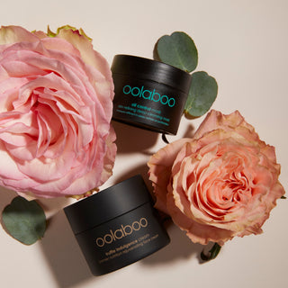 Oolaboo Oil Control Mask ved siden af Truffle Indulgence Cream med roser