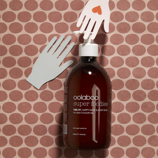 Oolaboo Super Foodies Happy Hand Soap mellem papirhænder